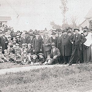 Group photograph of adults and children