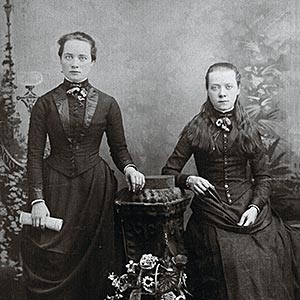 Portrait of two home children - young women